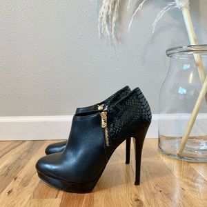 Michael Kors heeled booties.